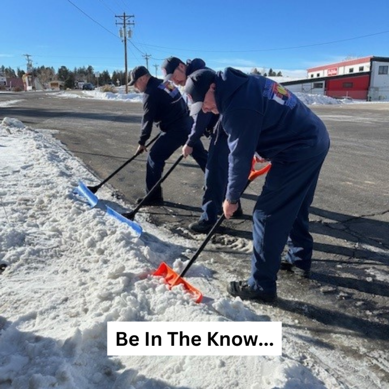Firefighters shoveling snow with the caption "Be In The Know..."