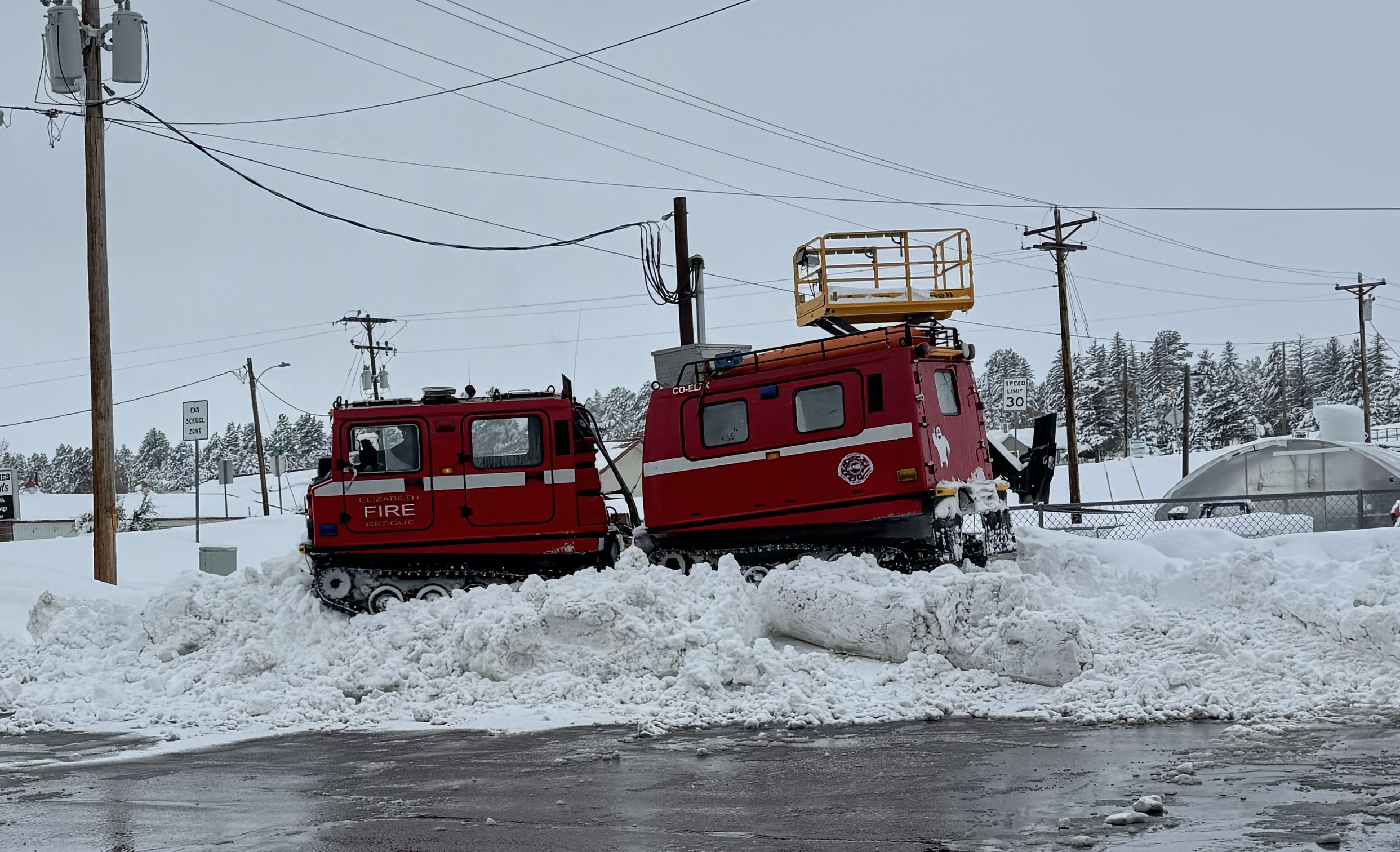 Various fire department activities throughout the year - Snow Cat in the snow