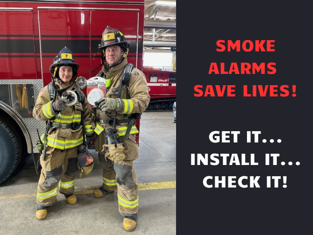 Firefighters holding smoke alarms with the caption "Smoke Alarms Save Lives! Get it...Install it...Check it!"
