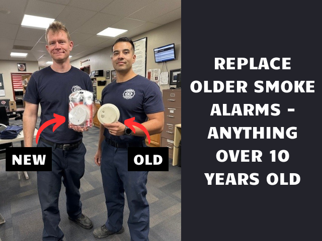 One firefighter holding a new smoke alarm and one firefighter holding an old smoke alarm with the caption "Replace Older Smoke Alarms - Anything Over 10 Years Old"