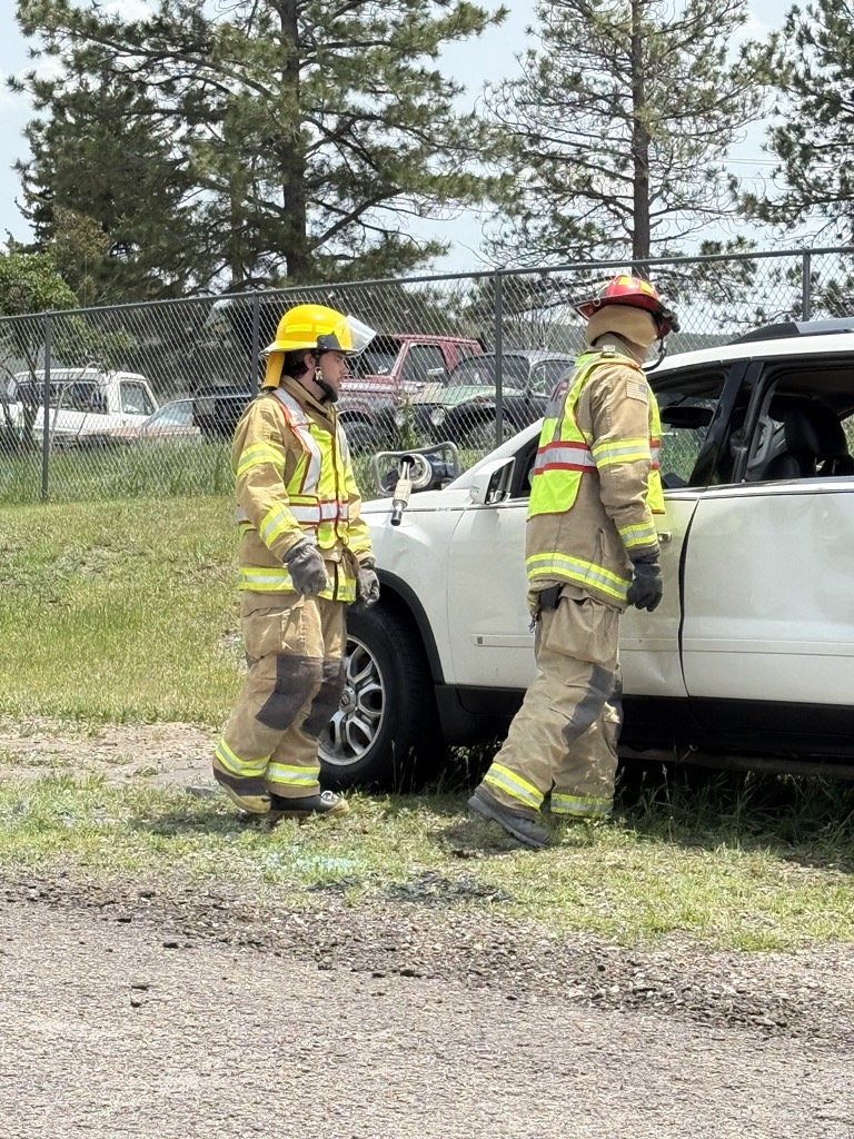 Crews during a mock car accident