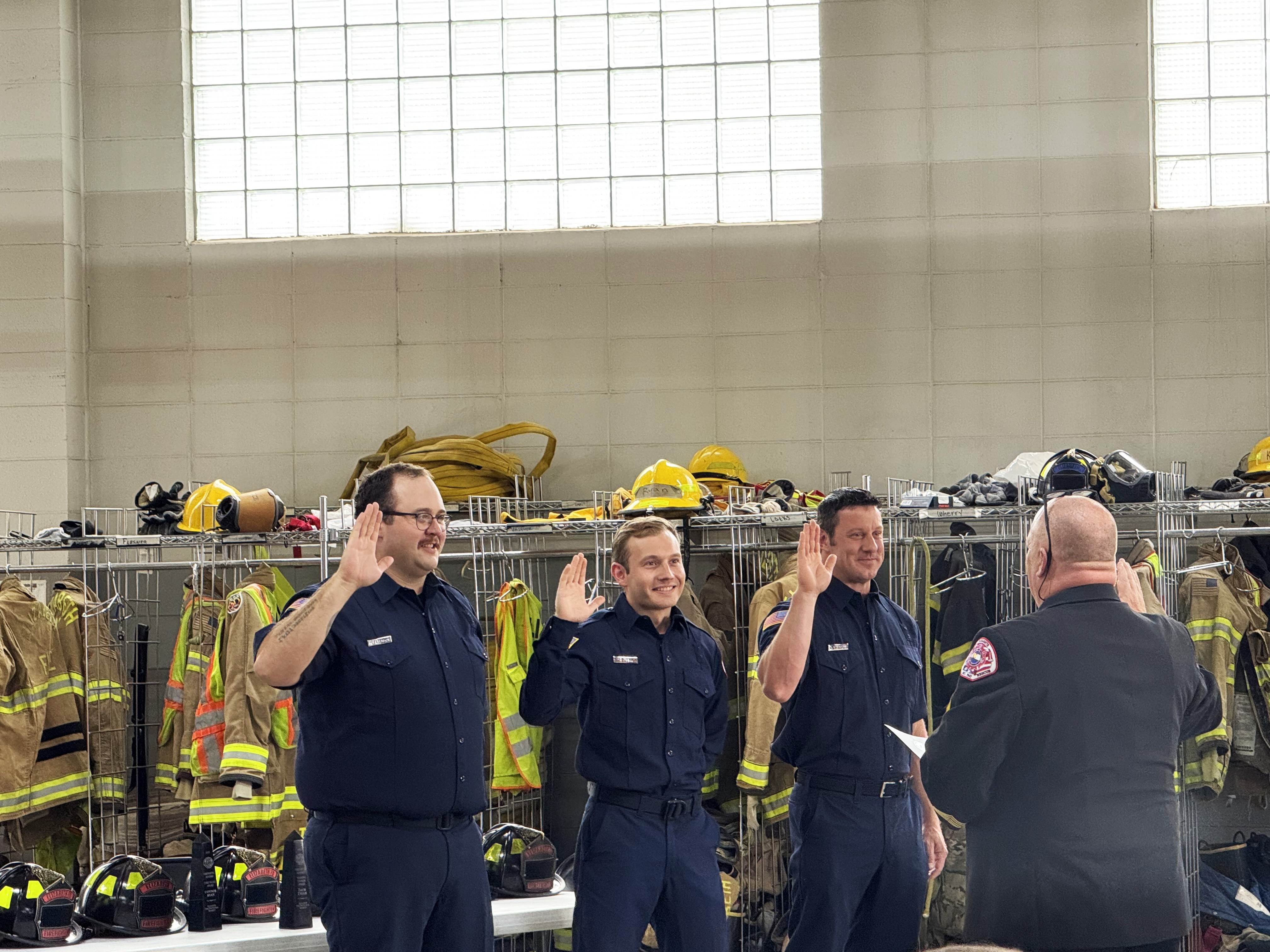 Full-time staff Micah Peterson, Trace Tobin, and Nicholas Wisthoff giving their oaths during the 2025 Academy Graduation & Pinning Ceremony