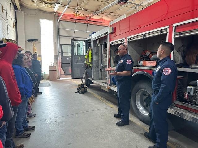 Crews giving a station tour